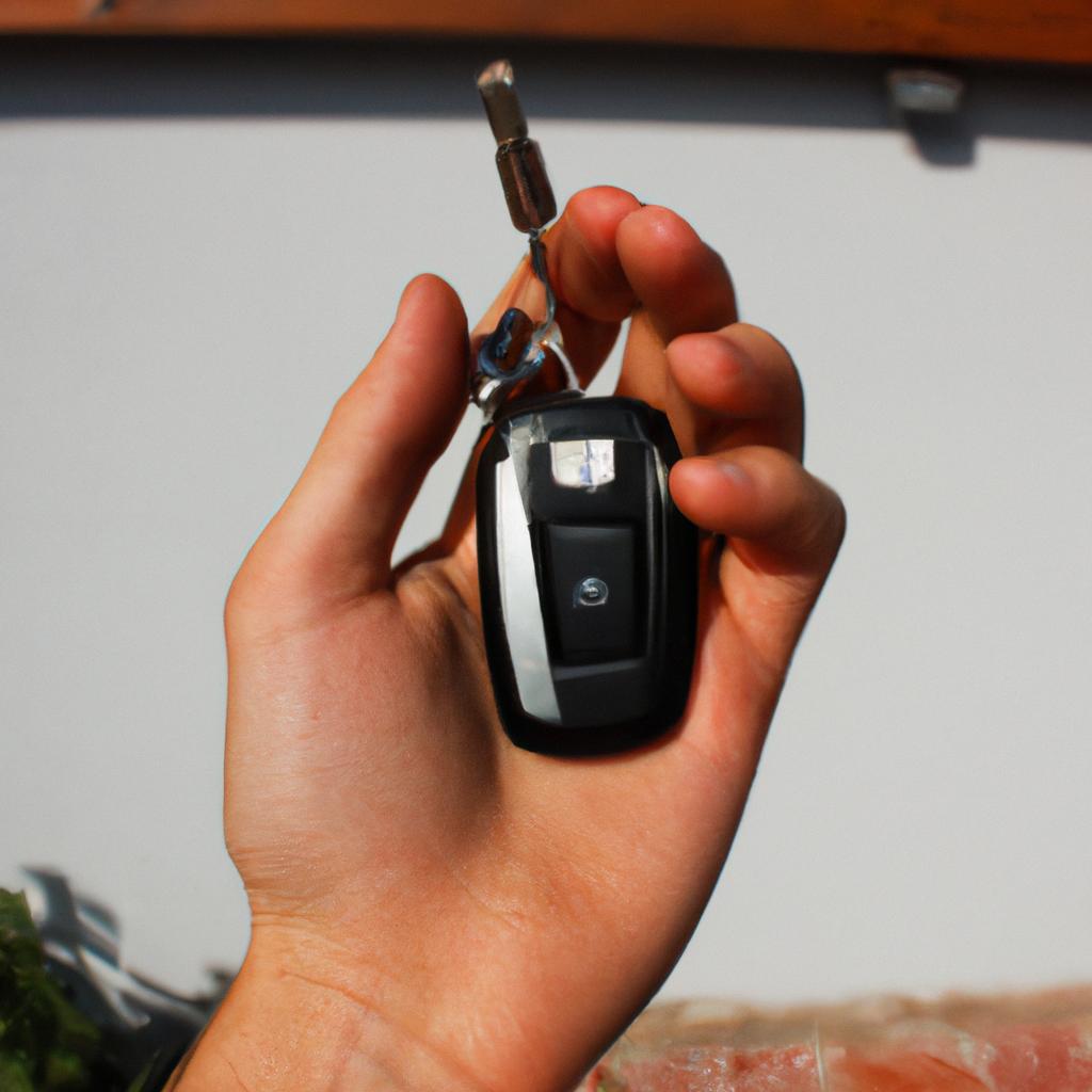 Person holding electric vehicle keys